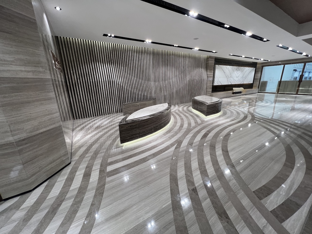 White Wood Marble custom waterjet flooring with curved marble inlay