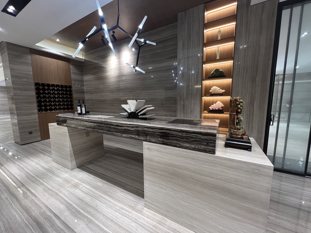 White Wood Marble vein cut flooring wall cladding and custom stone counter in luxury interior