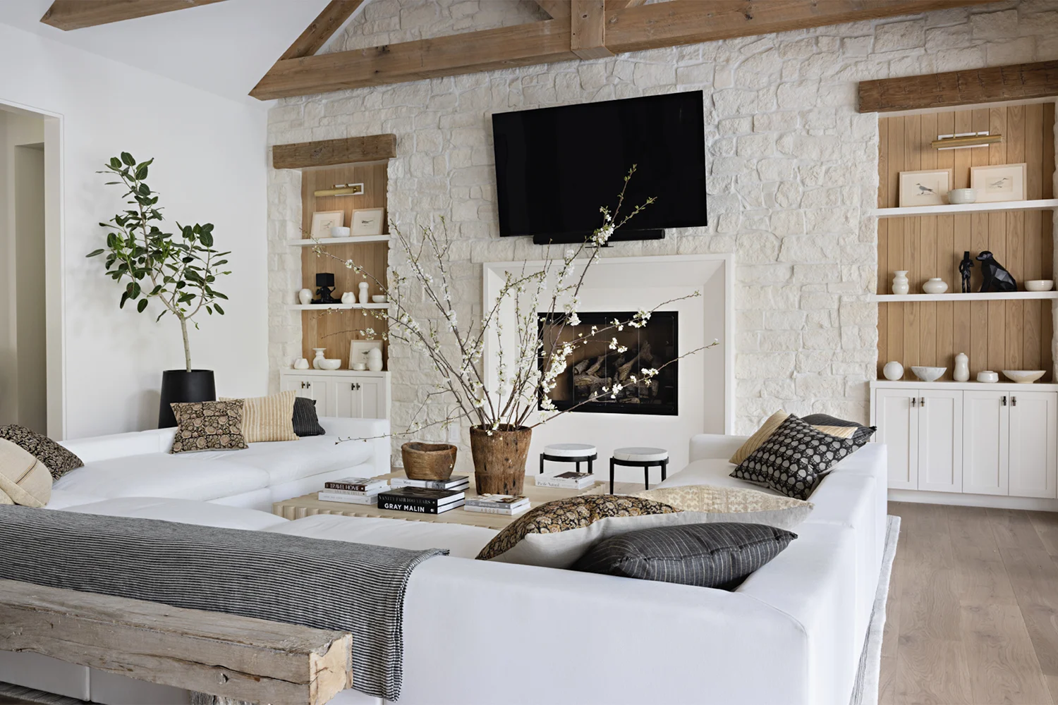 White Wood Marble natural face wall stone on a living room fireplace feature wall
